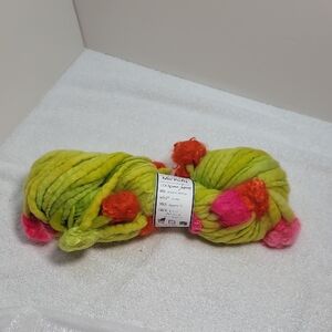 Mo' Puffs Lime/Neon Colorful Yarn with Pink and Orange Pom Poms